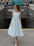Nathalia | Vestido midi de tirantes anudables con estampado de rayas