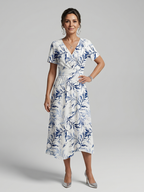 Kael | Vestido midi con escote en V y delicado estampado botánico