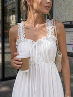 Leach | Vestido midi sin mangas, con tirantes con volantes y falda vaporosa