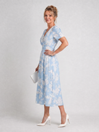 Marion | Vestido midi con estampado floral, escote en V y mangas cortas