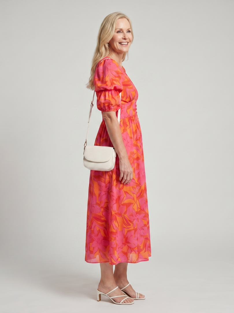 Zarelle | Vestido midi con escote en V y mangas abullonadas, en un estampado floral audaz