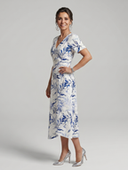 Kael | Vestido midi con escote en V y delicado estampado botánico