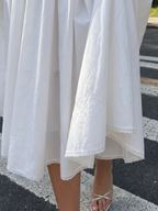 Neime | Vestido midi sin mangas con botonadura frontal y falda evasé