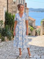 Marion | Vestido midi con estampado floral, escote en V y mangas cortas