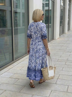 Tallis | Elegante vestido floral con cuello en V