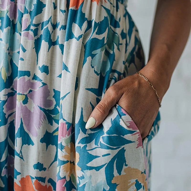 FIONA | Vestido maxi floral de tirantes ajustables que realza tu figura